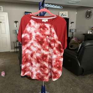 No comment burnt orange short sleeve blouse. But one get one free. 2X